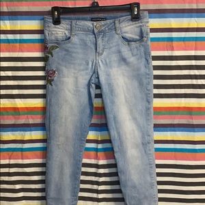 Light wash jeans with embroidered roses